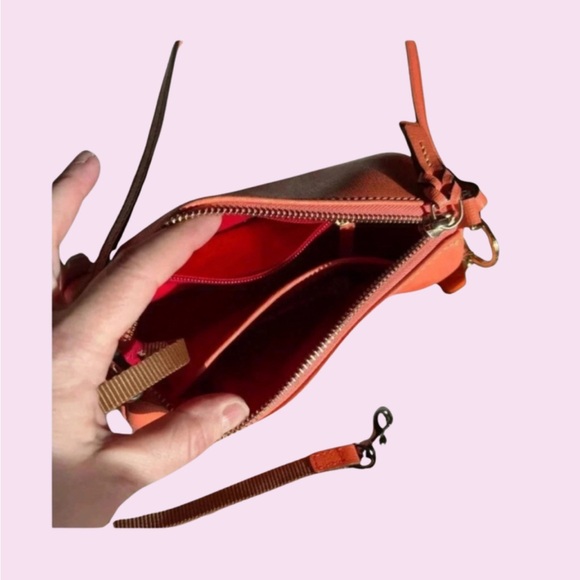 Dooney & Bourke Penrose Small Barrel Crossbody Tangerine Like New - Picture 4 of 5